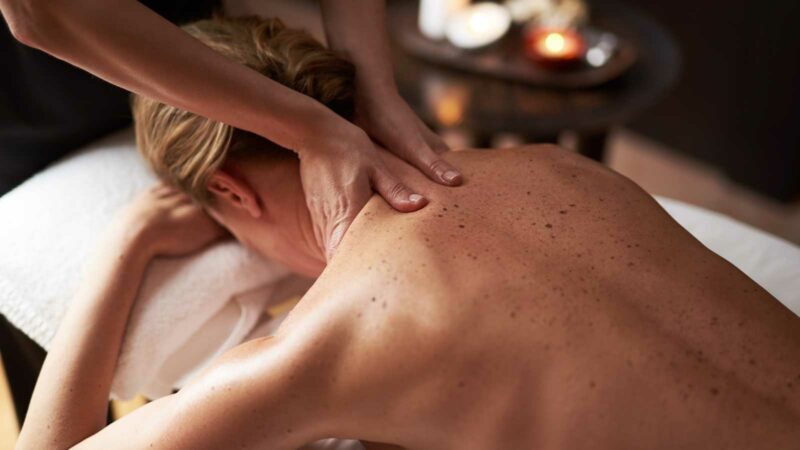 lady having upper back massage
