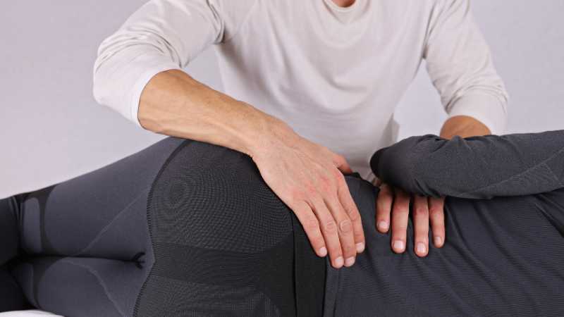 osteopath treating low back